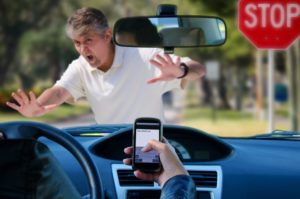 Texting and driving wreck hitting pedestrian