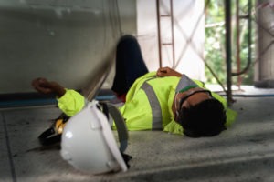 construction worker lying on the ground