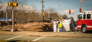 overturned logging truck