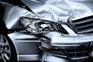 smashed front-end of a silver car